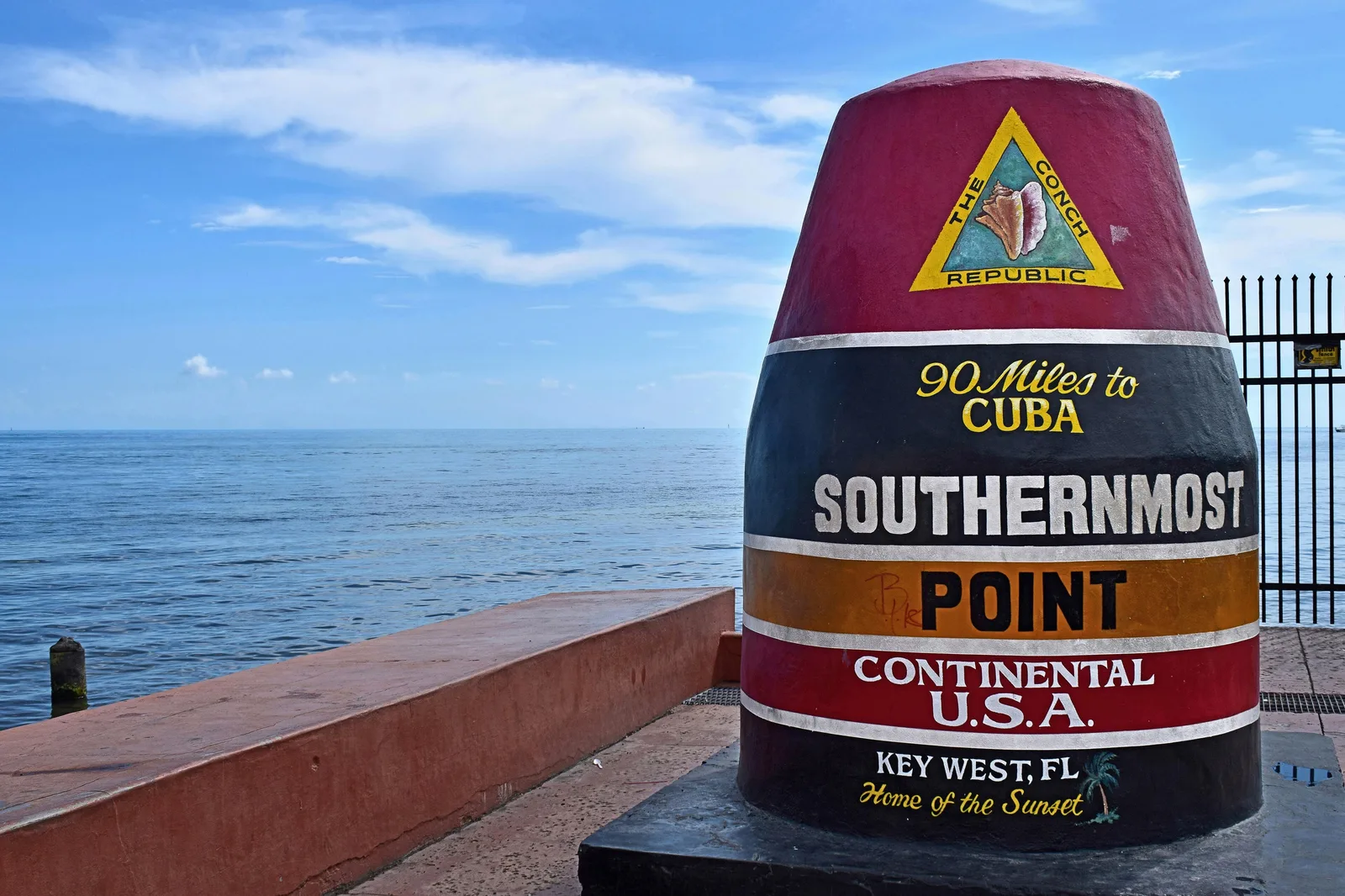 The Southernmost Point buoy in Key West, painted with the words 90 Miles to Cuba