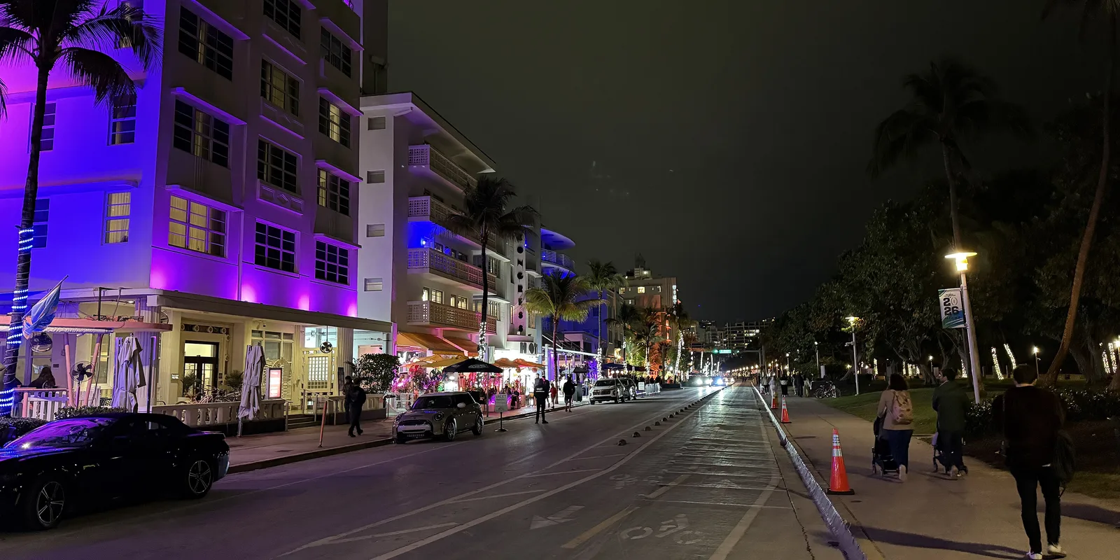 Ocean Drive in South Beach at night, its Art Deco hotels lit in neon