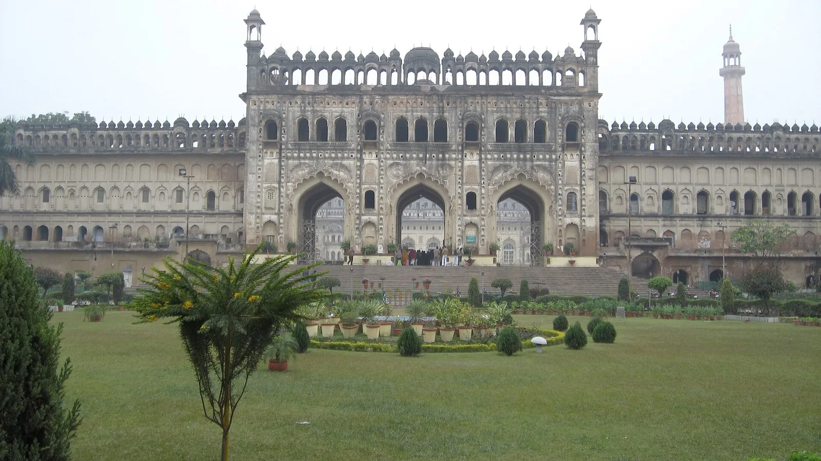 The great gateway of the Bara Imambara in Lucknow, seen across its lawns